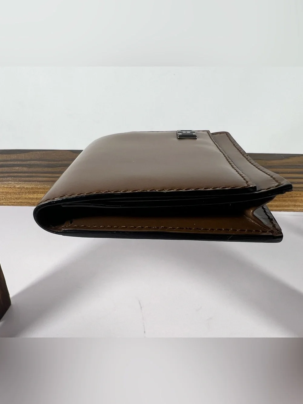 1257: Salvatore Ferragamo Gancini Leather Coin Wallet Brown